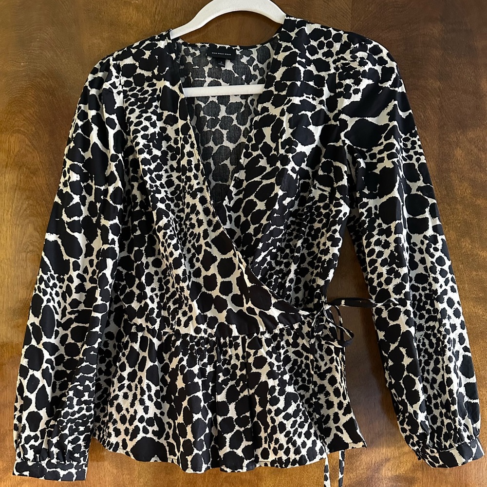 Black print wrap peplum blouse